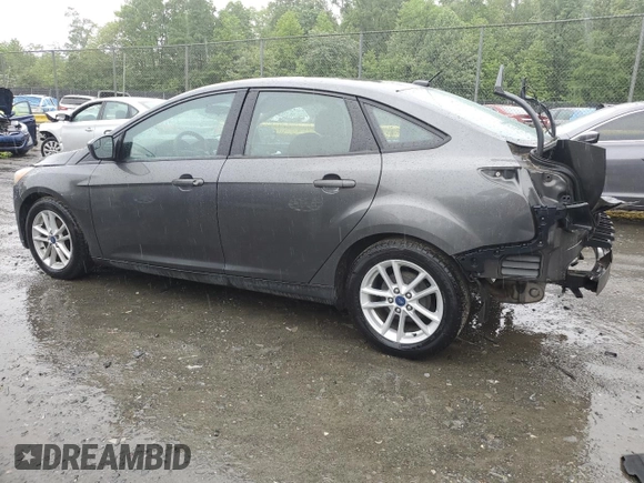 2018 Ford Focus SE z VIN 1FADP3F21JL285417, wystawiony jako Copart lot #56936965 z przebiegiem Nie podano mil oraz Czysty tytuł • Clean title. Historia ofert i sprzedaży dostępna na DreamBid. Obrazek 2.