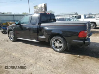 2000 Ford F-150 XL with VIN 2FTRX07L6YCA93968, listed as a Copart auction lot 52541195 with 252,092 mi miles and Salvage title. Bid and sale history available at DreamBid. Image 2.