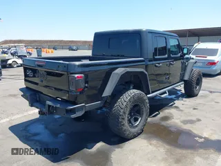 2020 Jeep Gladiator Sport S with VIN 1C6HJTAGXLL123540, listed as a IAAI auction lot 42453999 with 27,855 mi miles and . Bid and sale history available at DreamBid. Image 4.