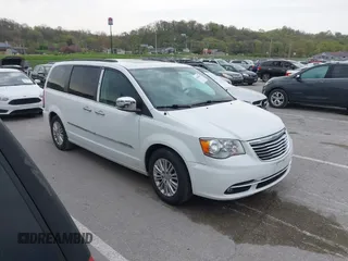 2015 Chrysler Town & Country Touring-L with VIN 2C4RC1CG9FR573863, listed as a IAAI auction lot 42036034 with 141,390 mi miles. Bid and sale history available at carsss.com. Image 1.