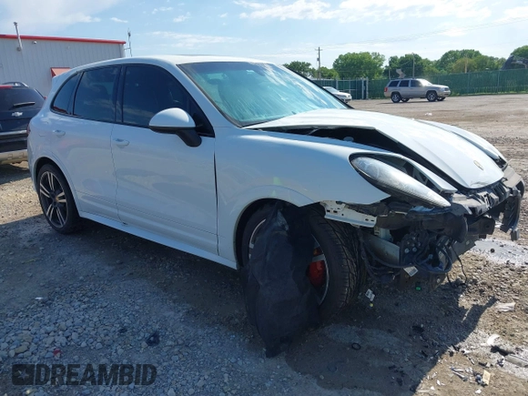 2013 Porsche Cayenne GTS with VIN WP1AD2A25DLA77759, listed as a IAAI auction lot 42316241 with 212,034 mi miles and . Bid and sale history available at DreamBid. Image 1.