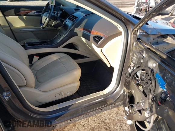2015 Lincoln MKZ Hybrid with VIN 3LN6L2LU3FR624116, listed as a IAAI auction lot 41697007 with 59,083 mi miles. Bid and sale history available at carsss.com. Image 5.