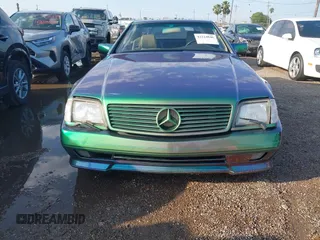 1990 Mercedes-Benz 500 z VIN WDBFA66E7LF005953, wystawiony jako IAAI lot #42224846 z przebiegiem 87 388 mil mil oraz . Historia ofert i sprzedaży dostępna na DreamBid. Obrazek 6.