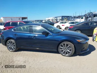 2021 Mazda 6 Grand Touring with VIN JM1GL1TY3M1619771, listed as a IAAI auction lot 40964809 with 25,816 mi miles and . Bid and sale history available at DreamBid. Image 13.