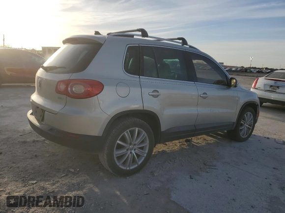 2011 Volkswagen Tiguan SEL w/Premium Navi with VIN WVGAV7AX8BW542758, listed as a Copart auction lot 49356485 with 77,958 mi miles and Salvage Title. Bid and sale history available at DreamBid. Image 3.
