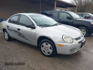 2005 Dodge Neon SE with VIN 1B3ES26C75D277100, listed as a IAAI auction lot 41736101 with 121,207 mi miles. Bid and sale history available at carsss.com. Image 1.