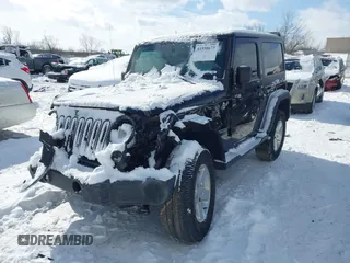 2014 Jeep Wrangler Sport with VIN 1C4AJWAG5EL285994, listed as a IAAI auction lot 41558673 with 98,779 mi miles and . Bid and sale history available at DreamBid. Image 2.