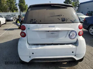 2014 Smart fortwo Pure with VIN WMEEJ3BA3EK780633, listed as a Copart auction lot 54009185 with 104,688 mi miles and Clean Title. Bid and sale history available at DreamBid. Image 6.