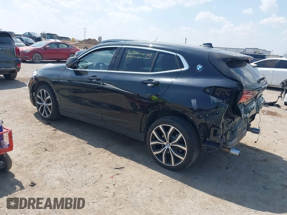 2018 BMW X2 xDrive28i with VIN WBXYJ5C33JEF80454, listed as a IAAI auction lot 41876188 with 34,596 mi miles. Bid and sale history available at carsss.com. Image 3.