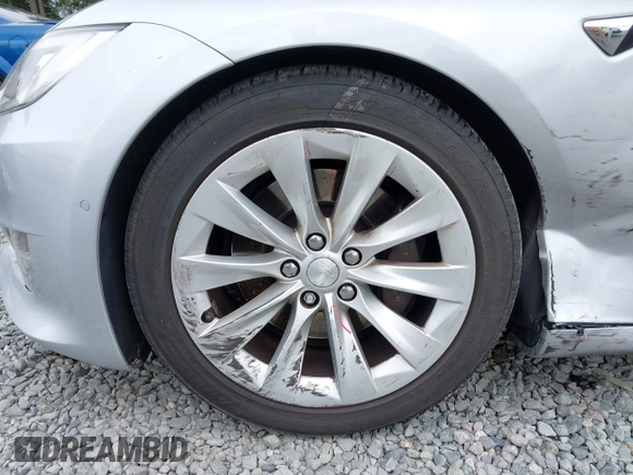 2017 Tesla Model S 60 z VIN 5YJSA1E11HF217633, wystawiony jako IAAI lot #42586913 z przebiegiem 152 987 mil mil oraz . Historia ofert i sprzedaży dostępna na DreamBid. Obrazek 20.