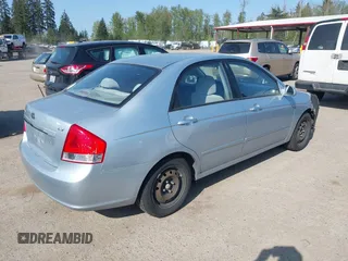 2007 Kia Spectra EX with VIN KNAFE121175389331, listed as a IAAI auction lot 42078709 with 199,324 mi miles. Bid and sale history available at carsss.com. Image 4.