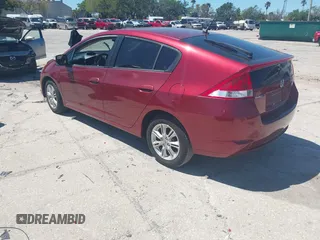 2010 Honda Insight EX with VIN JHMZE2H71AS021062, listed as a IAAI auction lot 41857350 with 45,558 mi miles and . Bid and sale history available at carsss.com. Image 3.