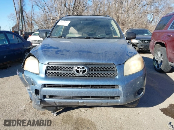 2006 Toyota RAV4 with VIN JTMBD33V565031424, listed as a IAAI auction lot 41457049 with 207,715 mi miles. Bid and sale history available at carsss.com. Image 12.