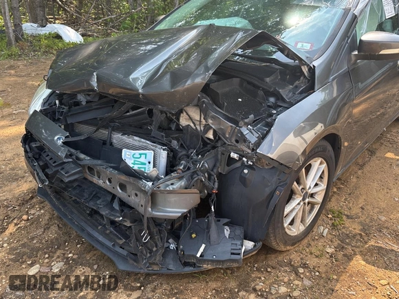 2017 Ford Focus SE with VIN 1FADP3F23HL200927, listed as a Copart auction lot 60996055 with Not provided miles and Clean title. Bid and sale history available at DreamBid. Image 6.