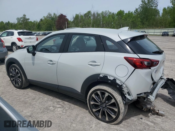 2019 Mazda CX-3 Touring z VIN JM1DKFC76K1451342, wystawiony jako Copart lot #58413935 z przebiegiem 21 391 mil mil oraz Szkoda całkowita • Salvage title. Historia ofert i sprzedaży dostępna na DreamBid. Obrazek 2.