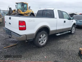 2006 Ford F-150 XLT with VIN 1FTPX14596NA27117, listed as a IAAI auction lot 41589818 with 166,727 mi miles. Bid and sale history available at carsss.com. Image 4.