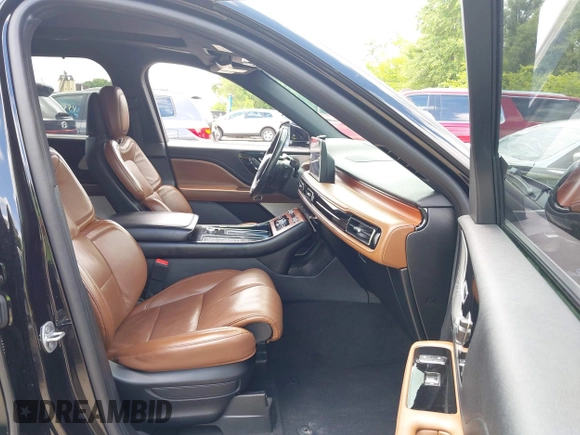 2020 Lincoln Aviator Grand Touring with VIN 5LMYJ8XY2LGL35999, listed as a IAAI auction lot 42344715 with 54,449 mi miles and . Bid and sale history available at DreamBid. Image 5.
