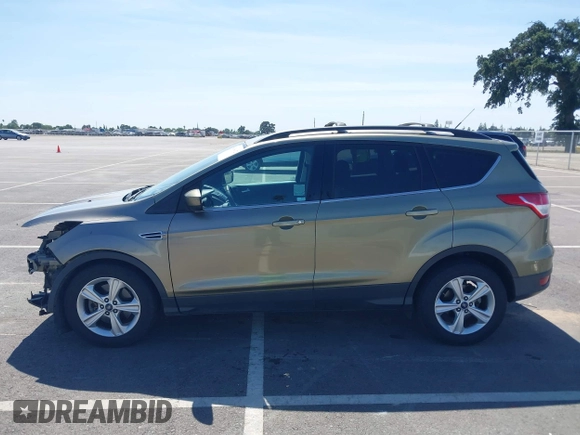 2013 Ford Escape SE with VIN 1FMCU0G99DUC05901, listed as a IAAI auction lot 42194672 with 121,435 mi miles and . Bid and sale history available at DreamBid. Image 15.