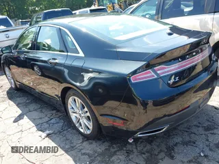 2014 Lincoln MKZ Hybrid with VIN 3LN6L2LU4ER811119, listed as a IAAI auction lot 42190415 with 98,898 mi miles and . Bid and sale history available at DreamBid. Image 3.