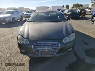 2001 Chrysler LHS z VIN 2C3AC56G31H606648, wystawiony jako Copart lot #77123814 z przebiegiem 83 574 mil mil oraz Tytuł czysty. Historia ofert i sprzedaży dostępna na DreamBid. Obrazek 5.