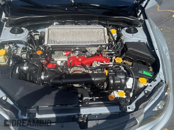 2012 Subaru WRX WRX STI with VIN JF1GV8J65CL002496, listed as a Copart auction lot 64390005 with 182,855 mi miles and Clean title. Bid and sale history available at DreamBid. Image 7.