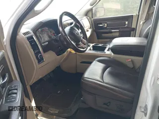 2014 Ram 1500 Longhorn z VIN 1C6RR6PT0ES129729, wystawiony jako IAAI lot #42018089 z przebiegiem 126 074 mil mil oraz . Historia ofert i sprzedaży dostępna na DreamBid. Obrazek 5.