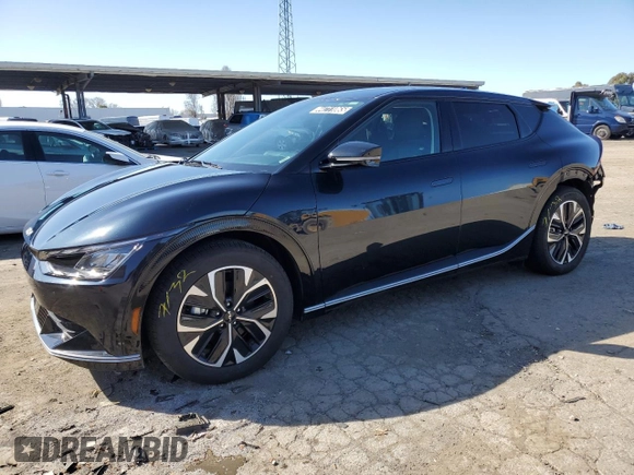 2024 Kia EV6 Wind with VIN KNDC3DLC8R5216325, listed as a Copart auction lot 44711065 with 7,715 mi miles and Salvage Title. Bid and sale history available at carsss.com. Image 1.
