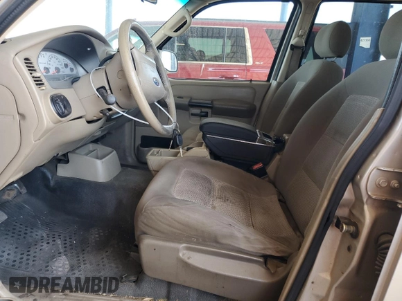 2004 Ford Explorer Sport Trac XLS with VIN 1FMZU67K14UC21140, listed as a Copart auction lot 57873115 with 131,040 mi miles and Clean title. Bid and sale history available at DreamBid. Image 7.