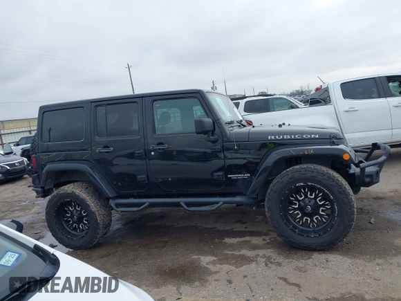 2017 Jeep Wrangler Unlimited Rubicon Recon z VIN 1C4HJWFG9HL592824, wystawiony jako IAAI lot #41427433 z przebiegiem 70 105 mil mil oraz . Historia ofert i sprzedaży dostępna na DreamBid. Obrazek 14.