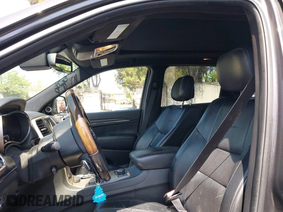 2014 Jeep Grand Cherokee Summit with VIN 1C4RJFJG8EC434899, listed as a IAAI auction lot 42399912 with 186,840 mi miles and . Bid and sale history available at DreamBid. Image 19.