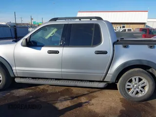 2010 Ford Explorer Sport Trac XLT z VIN 1FMEU3BE6AUF01646, wystawiony jako IAAI lot #41646440 z przebiegiem 58 473 mil mil oraz . Historia ofert i sprzedaży dostępna na DreamBid. Obrazek 15.