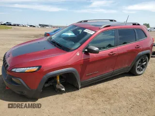 2017 Jeep Cherokee Trailhawk z VIN 1C4PJMBSXHW558559, wystawiony jako Copart lot #64548295 z przebiegiem 119 765 mil mil oraz Szkoda całkowita • Salvage title. Historia ofert i sprzedaży dostępna na DreamBid. Obrazek 1.