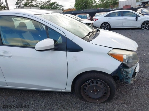 2014 Toyota Yaris L with VIN JTDKTUD39ED586791, listed as a IAAI auction lot 40958187 with 105,143 mi miles. Bid and sale history available at carsss.com. Image 19.