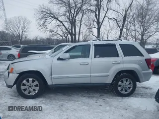 2008 Jeep Grand Cherokee with VIN 1J8HS58M58C117397, listed as a IAAI auction lot 41298484 with 208,095 mi miles and . Bid and sale history available at DreamBid. Image 14.