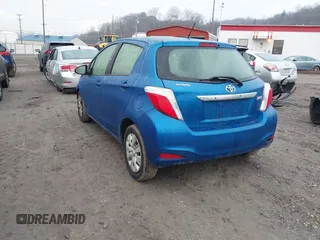 2013 Toyota Yaris L with VIN JTDKTUD30DD553855, listed as a IAAI auction lot 41485101 with 83,546 mi miles. Bid and sale history available at carsss.com. Image 3.
