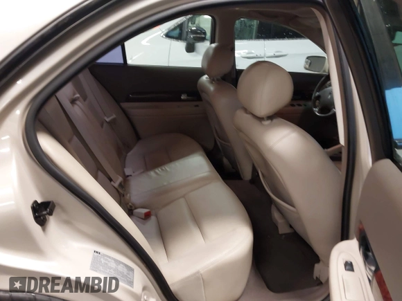 2002 Lincoln LS w/Base Pkg z VIN 1LNHM87AX2Y620293, wystawiony jako IAAI lot #41461349 z przebiegiem 129 295 mil mil oraz . Historia ofert i sprzedaży dostępna na DreamBid. Obrazek 8.