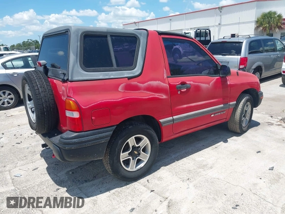 2002 Chevrolet Tracker z VIN 2CNBE18C926911755, wystawiony jako IAAI lot #42452154 z przebiegiem 129 098 mil mil oraz . Historia ofert i sprzedaży dostępna na DreamBid. Obrazek 4.