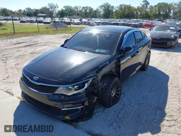 2018 Kia Optima LX with VIN 5XXGT4L3XJG203237, listed as a IAAI auction lot 40631696 with 157,012 mi miles and . Bid and sale history available at DreamBid. Image 6.