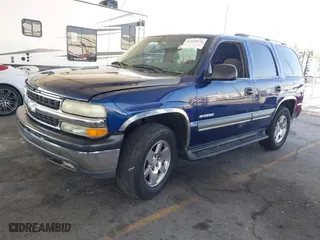 2003 Chevrolet Tahoe LT with VIN 1GNEC13T03J180708, listed as a IAAI auction lot 41543671 with 203,442 mi miles. Bid and sale history available at carsss.com. Image 2.