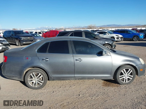 2005 Volkswagen Jetta 2.5L with VIN 3VWDF71K75M605160, listed as a IAAI auction lot 41624273 with 184,439 mi miles and . Bid and sale history available at DreamBid. Image 13.