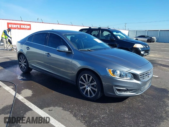 2017 Volvo S60 Inscription with VIN LYV402HK7HB120640, listed as a IAAI auction lot 41583114 with 71,884 mi miles. Bid and sale history available at carsss.com. Image 1.