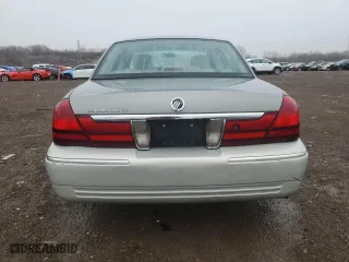 2004 Mercury Grand Marquis GS with VIN 2MEFM74W34X649223, listed as a Copart auction lot 51854155 with 124,398 mi miles and Salvage Title. Bid and sale history available at carsss.com. Image 6.