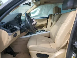 2012 BMW X5 35i with VIN 5UXZV4C5XCL761370, listed as a Copart auction lot 59436845 with 124,722 mi miles and Salvage title. Bid and sale history available at DreamBid. Image 7.