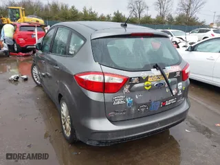 2013 Ford C-Max Hybrid SE with VIN 1FADP5AU2DL543064, listed as a IAAI auction lot 41721112 with 94,392 mi miles. Bid and sale history available at carsss.com. Image 3.