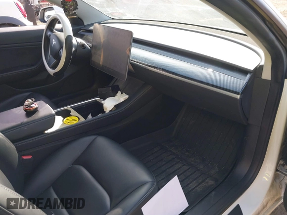 2021 Tesla Model 3 Long Range with VIN 5YJ3E1EB2MF858267, listed as a IAAI auction lot 41782360 with 79,671 mi miles and . Bid and sale history available at DreamBid. Image 5.