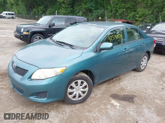 2009 Toyota Corolla z VIN 2T1BU40E39C031746, wystawiony jako IAAI lot #42542079 z przebiegiem 218 019 mil mil oraz . Historia ofert i sprzedaży dostępna na DreamBid. Obrazek 2.