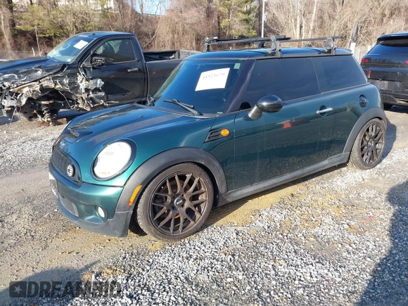 2007 MINI Hardtop S with VIN WMWMF73577TL89211, listed as a IAAI auction lot 41523679 with 136,705 mi miles and . Bid and sale history available at DreamBid. Image 2.