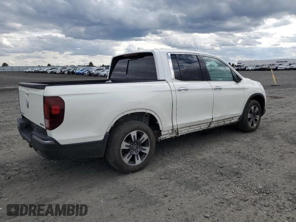 2019 Honda Ridgeline RTL-E with VIN 5FPYK3F74KB039057, listed as a Copart auction lot 57350525 with 105,102 mi miles and Salvage title. Bid and sale history available at DreamBid. Image 3.