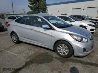 2014 Hyundai Accent GLS with VIN KMHCT4AE5EU621011, listed as a Copart auction lot 53577135 with 157,172 mi miles and Clean Title. Bid and sale history available at carsss.com. Image 4.
