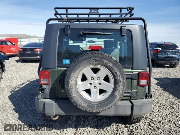 2009 Jeep Wrangler X with VIN 1J4FA24169L707695, listed as a Copart auction lot 49861955 with 89,807 mi miles and Salvage Title. Bid and sale history available at DreamBid. Image 6.